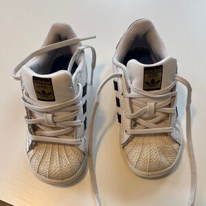 Adidas Kids White and Black Sneakers with Gold Highlights